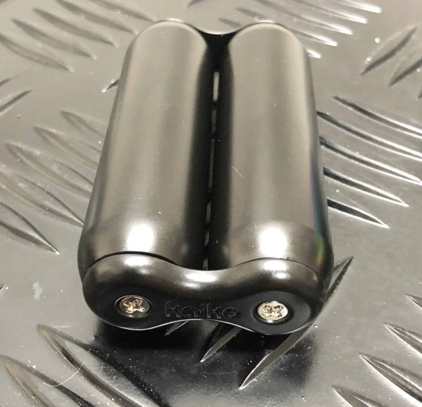 Close up of Smooth Black 180 gram Hand Fidget Roller by Kaiko