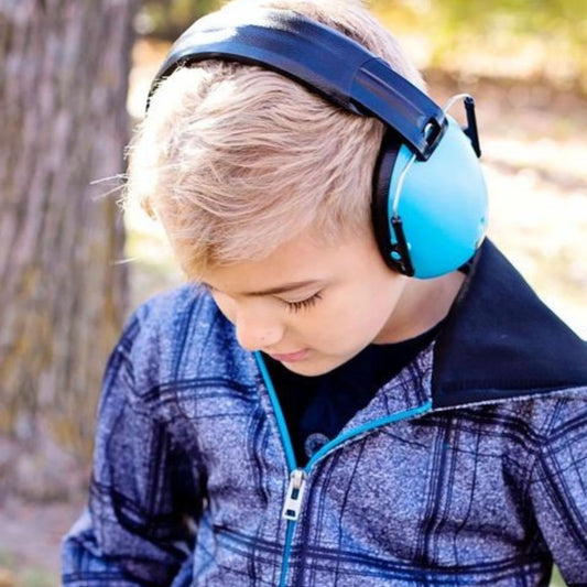 Child wearing Banz Hear No Blare Earmuffs Ear Defenders in Blue