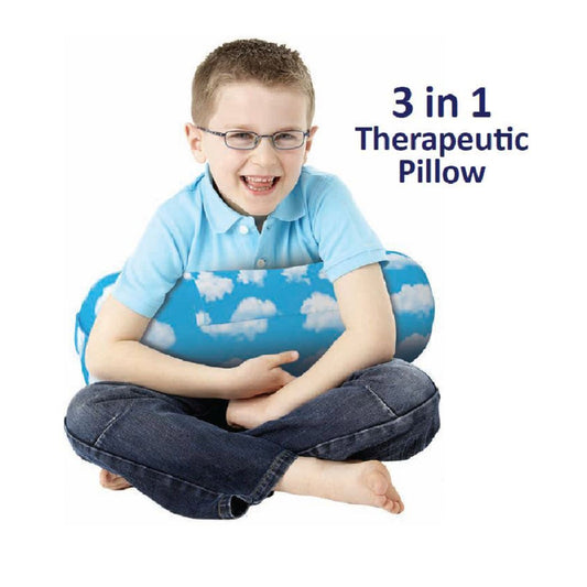 Child sitting on a 3-in-1 therapeutic pillow with a blue and white design, on a white background.