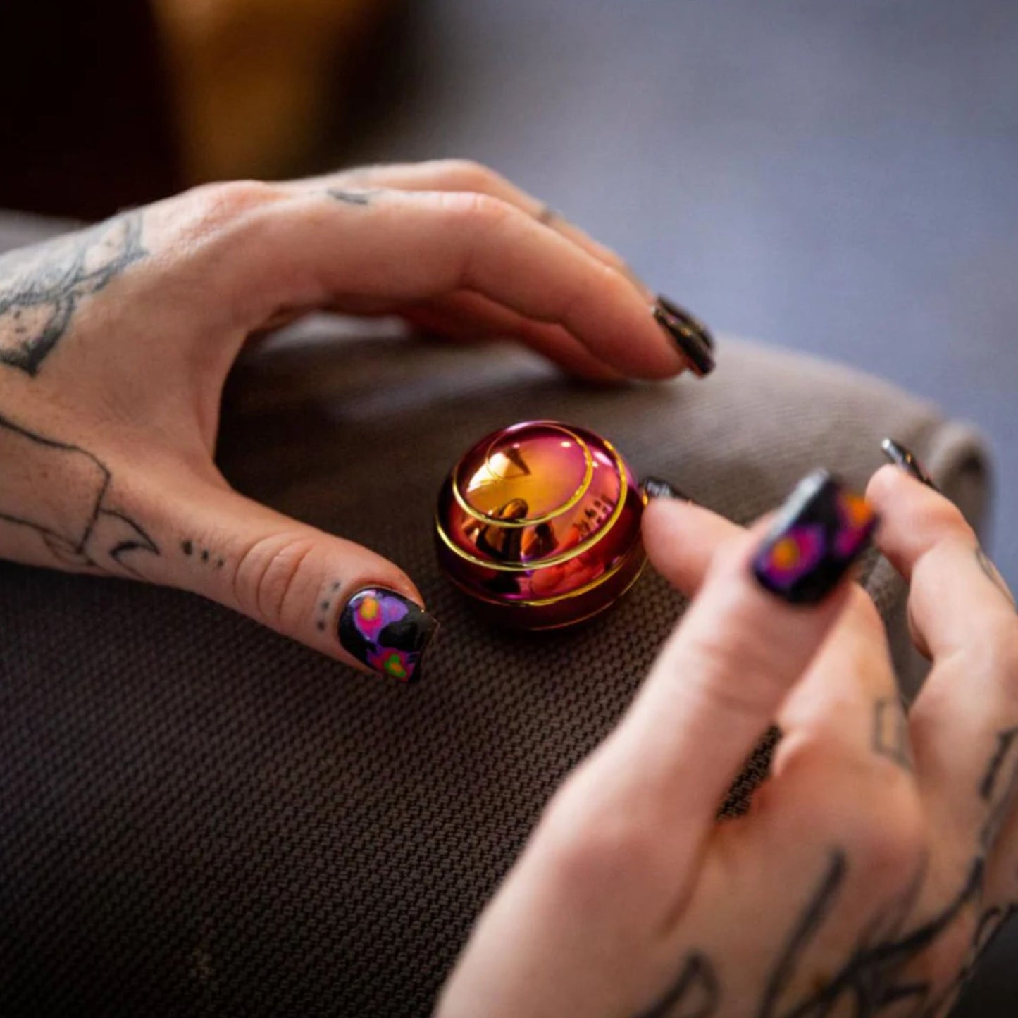 Person spinning Gyroscope Spinning Desktop Fidget by Kaiko in Oil Slick