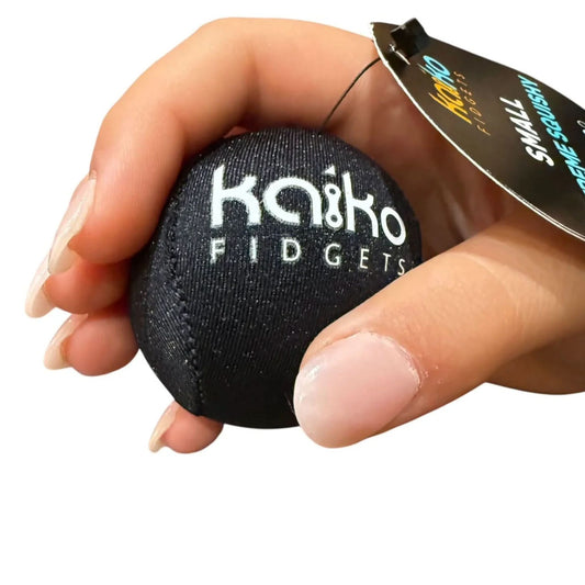 Black fidget ball held in a hand with 'Ko&ko Fidgets' branding.