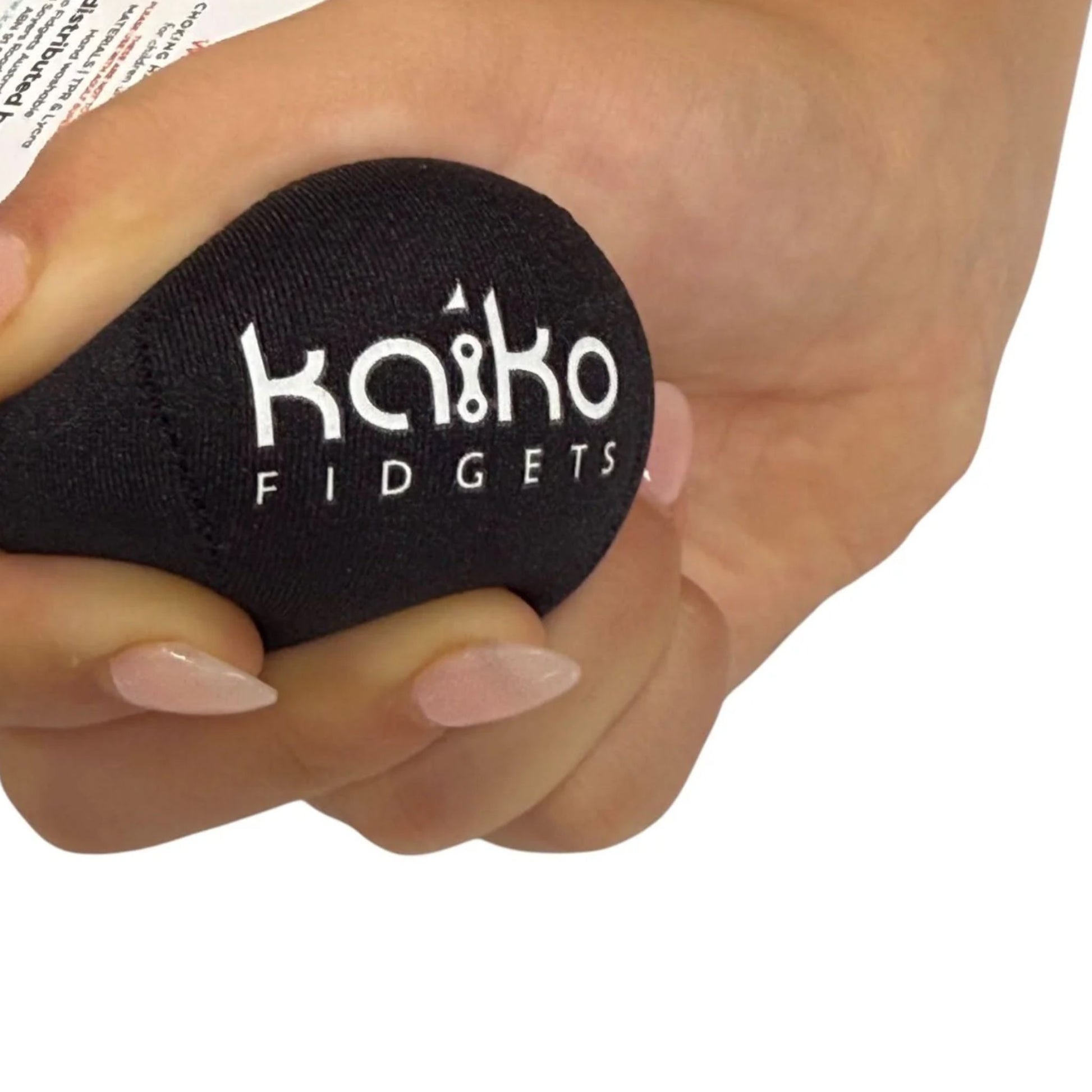Hand holding a black fidget ball with 'Knoiko Fidgets' branding on a white background