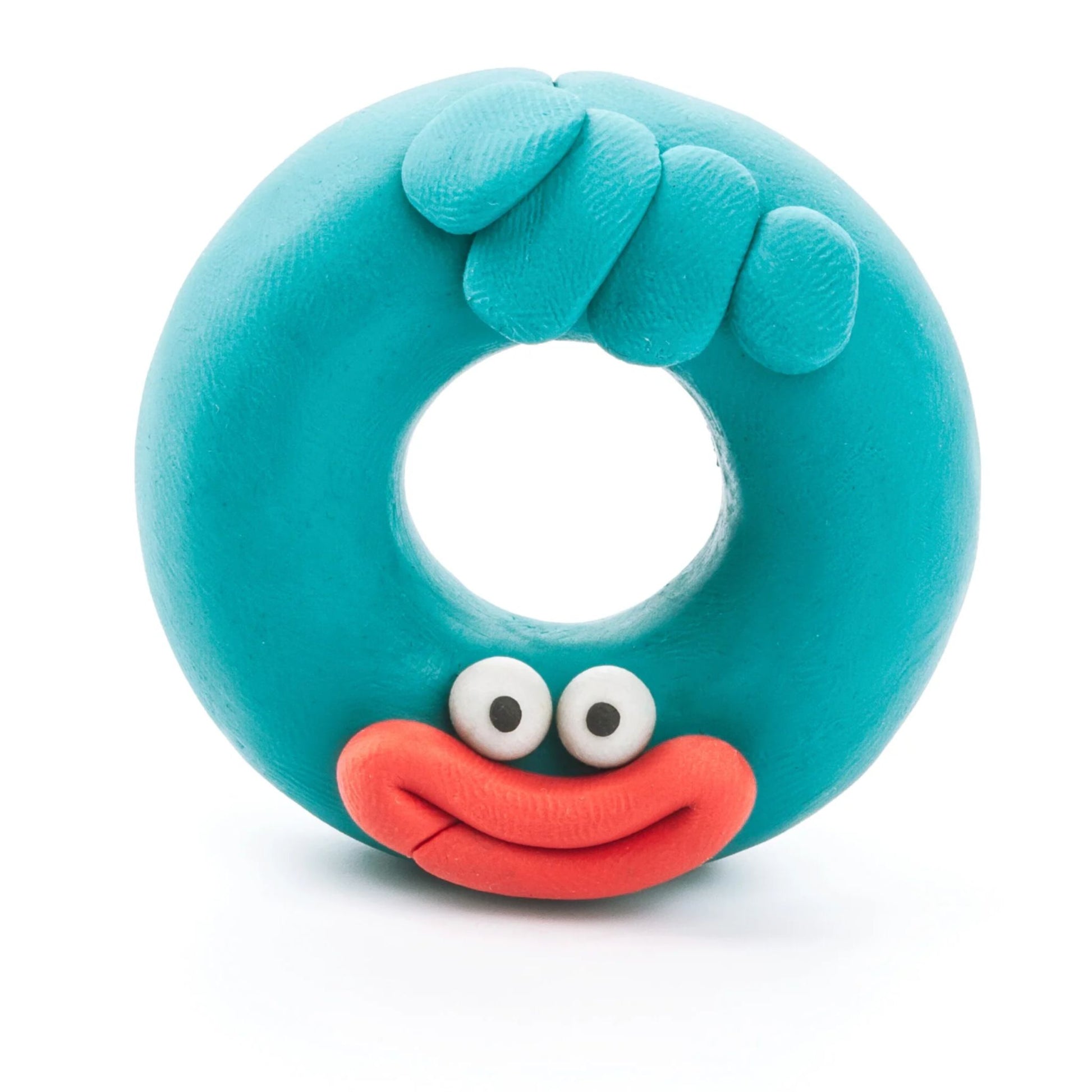 Doughnut-shaped blue monster made of Hey Clay air-dry clay on a white background