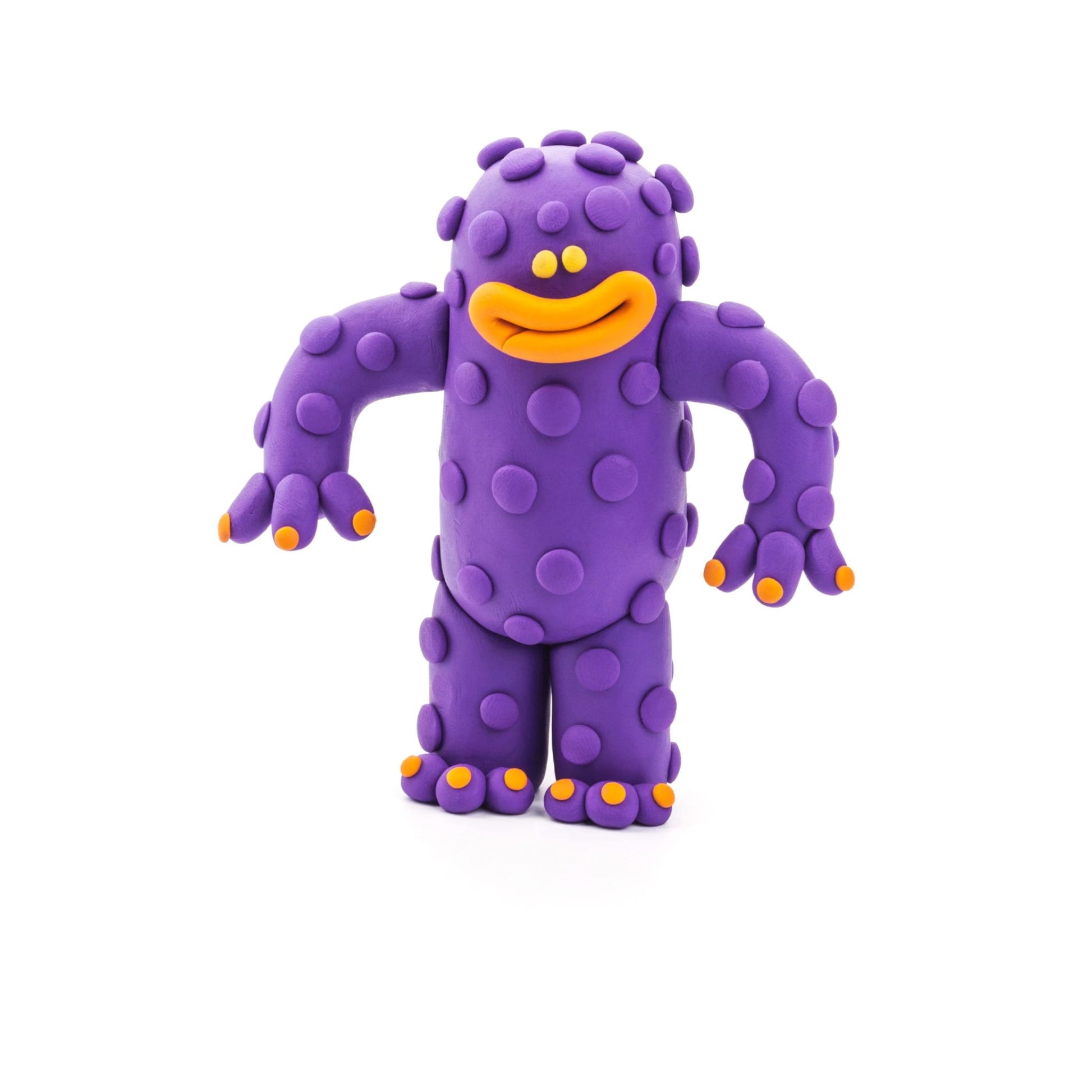 Purple monster made of Hey Clay air-dry clay on a white background