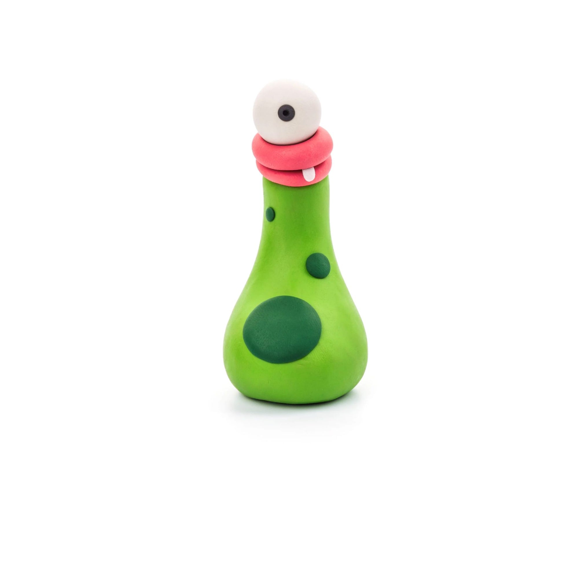 Green spotty made of Hey Clay air-dry clay on a white background