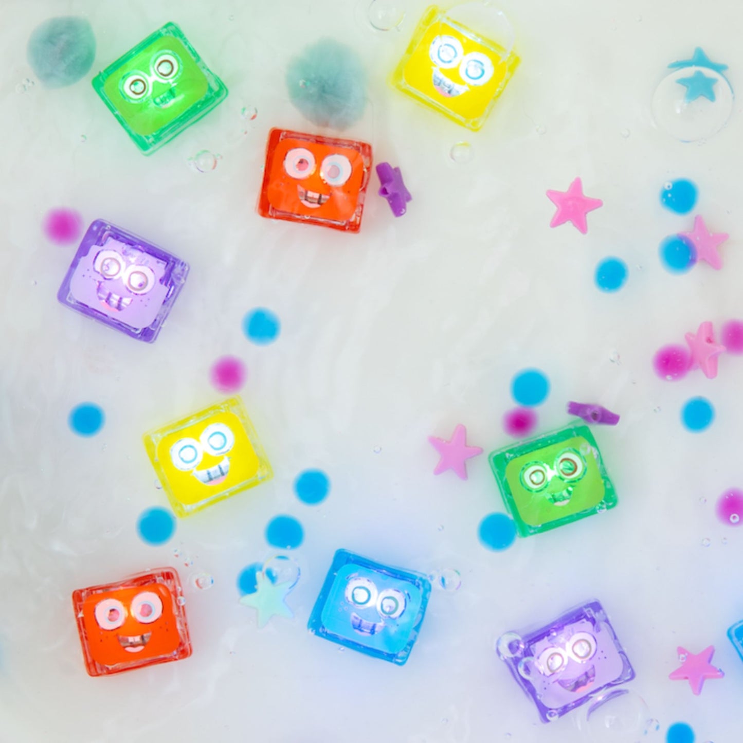 Colour assortment of Jellystone Designs Glo Pal Cubes - Water-activated sensory lights for sensory play