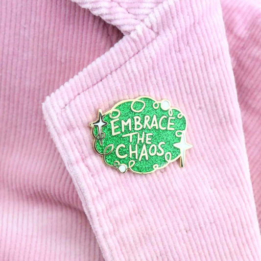 Jubly Umph Embrace the Chaos Lapel Pin
worn on jacket