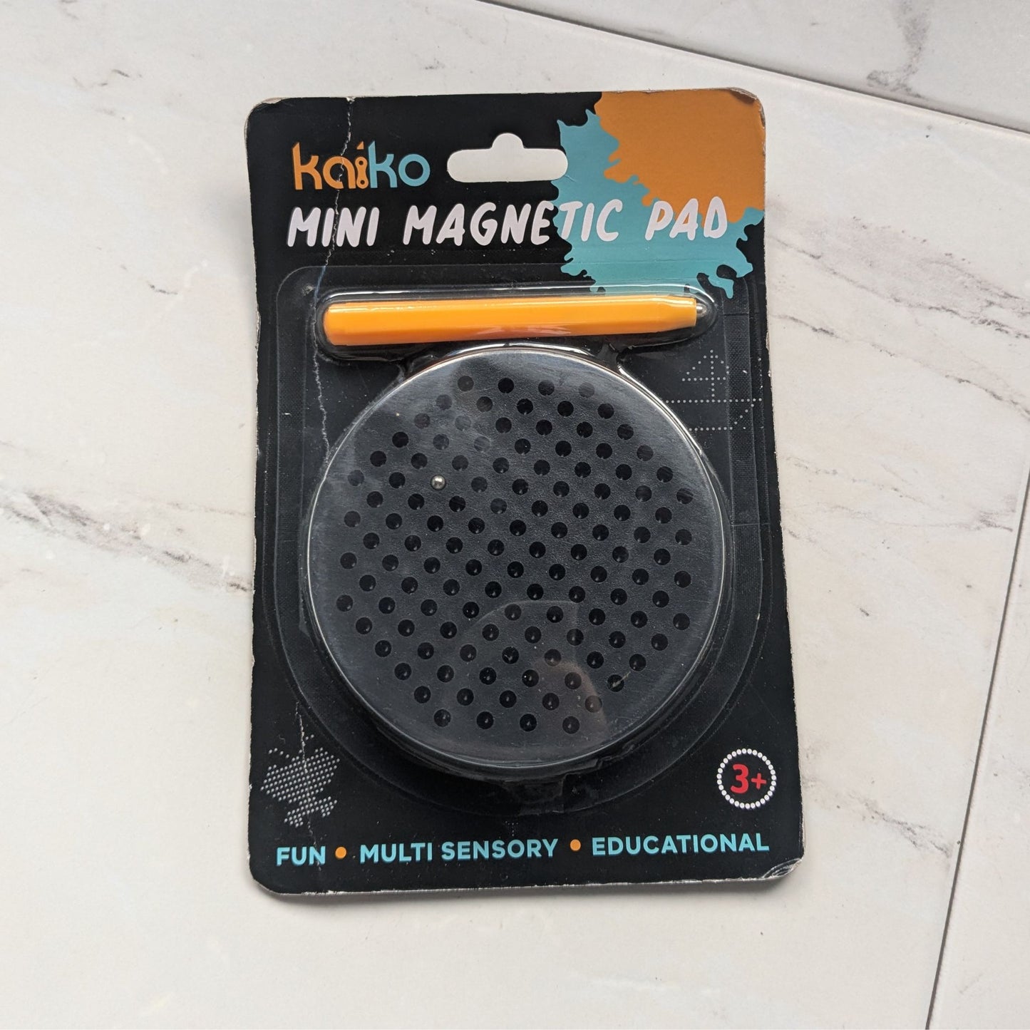 Kaiiko mini magnetic pad with a yellow stylus on a white background