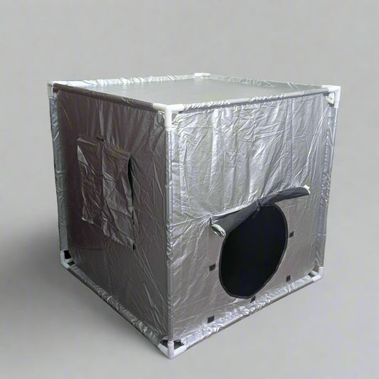 Silver Sensory Blackout Tent with a black circular door and closed side window