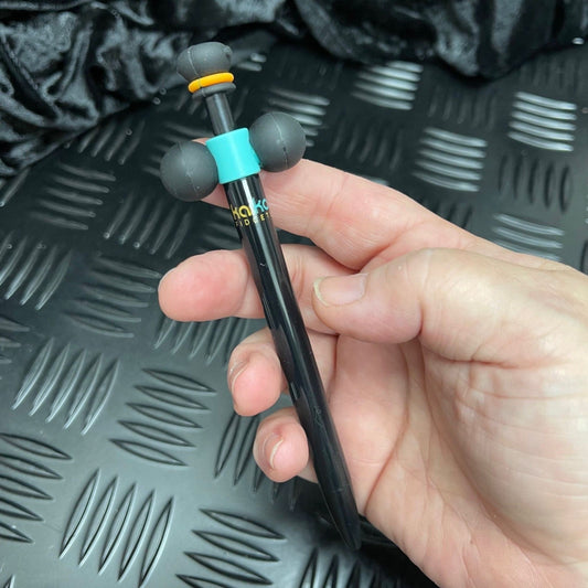 Person holding Sensory Fidget Pen by Kaiko with Quiet Spinner Feature