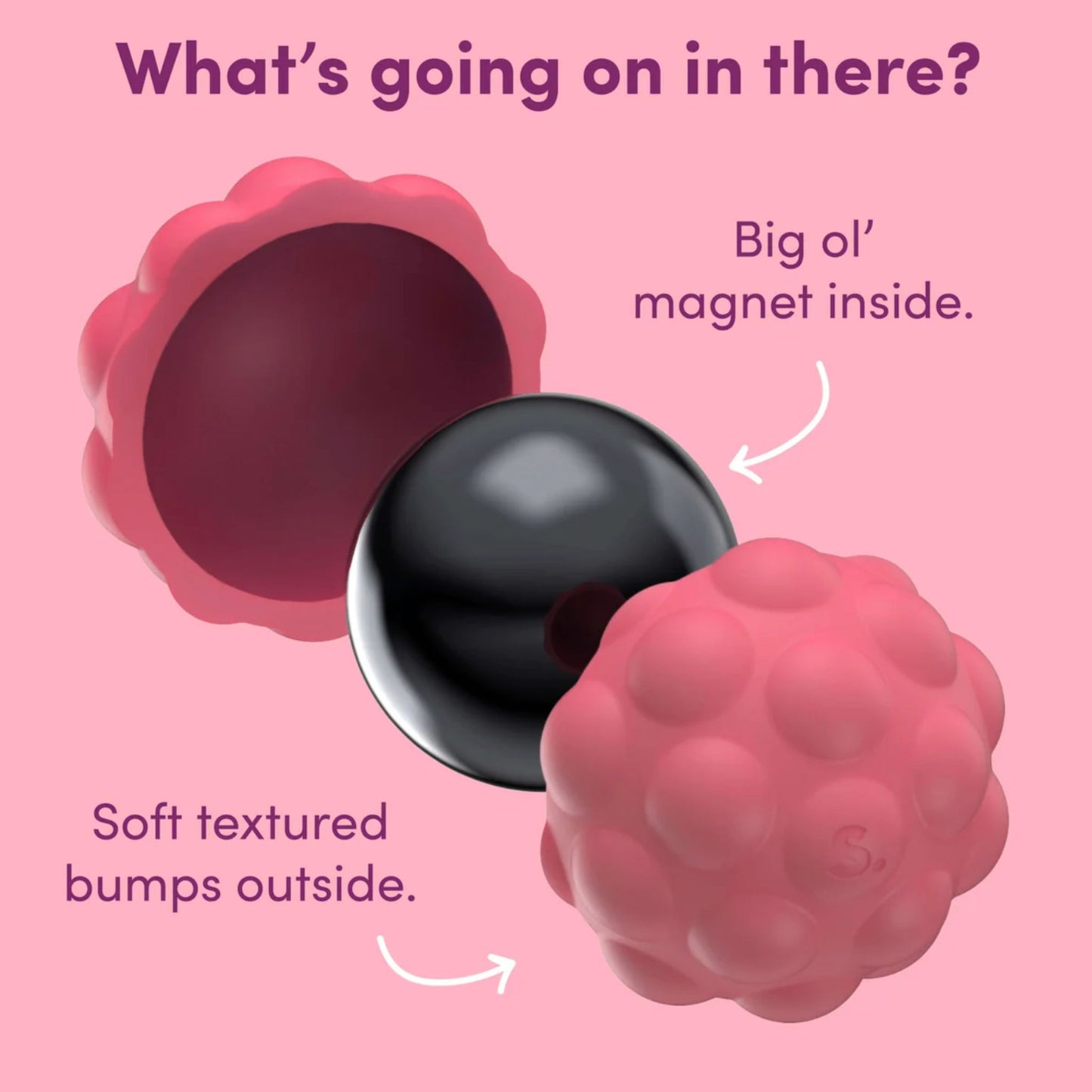 Pink Speks Odds rubberised silicone ball with a black magnet inside on a pink background