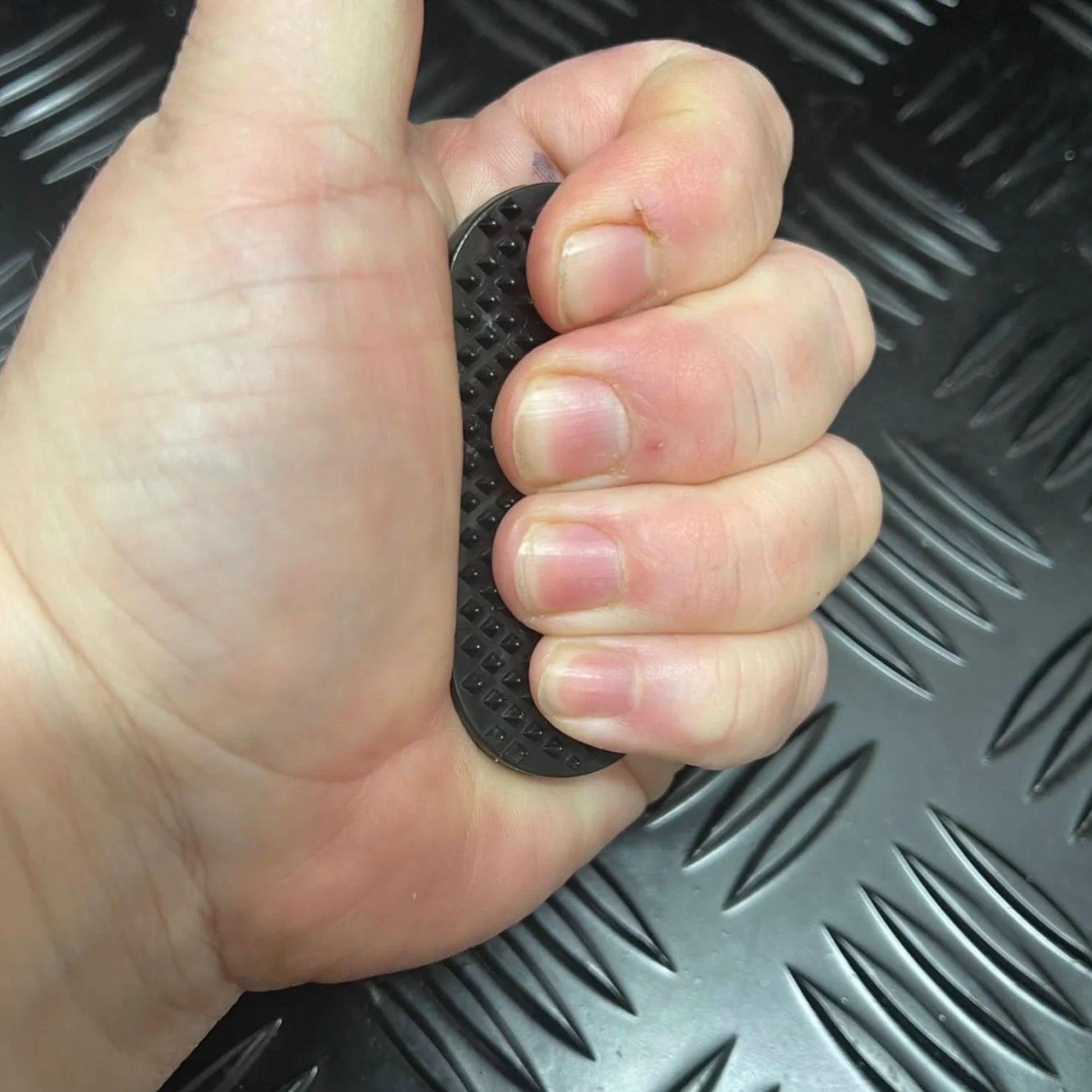 Hand squeezing Spikeyring with Dual Pads by Kaiko in Black - Harm & Picking Support