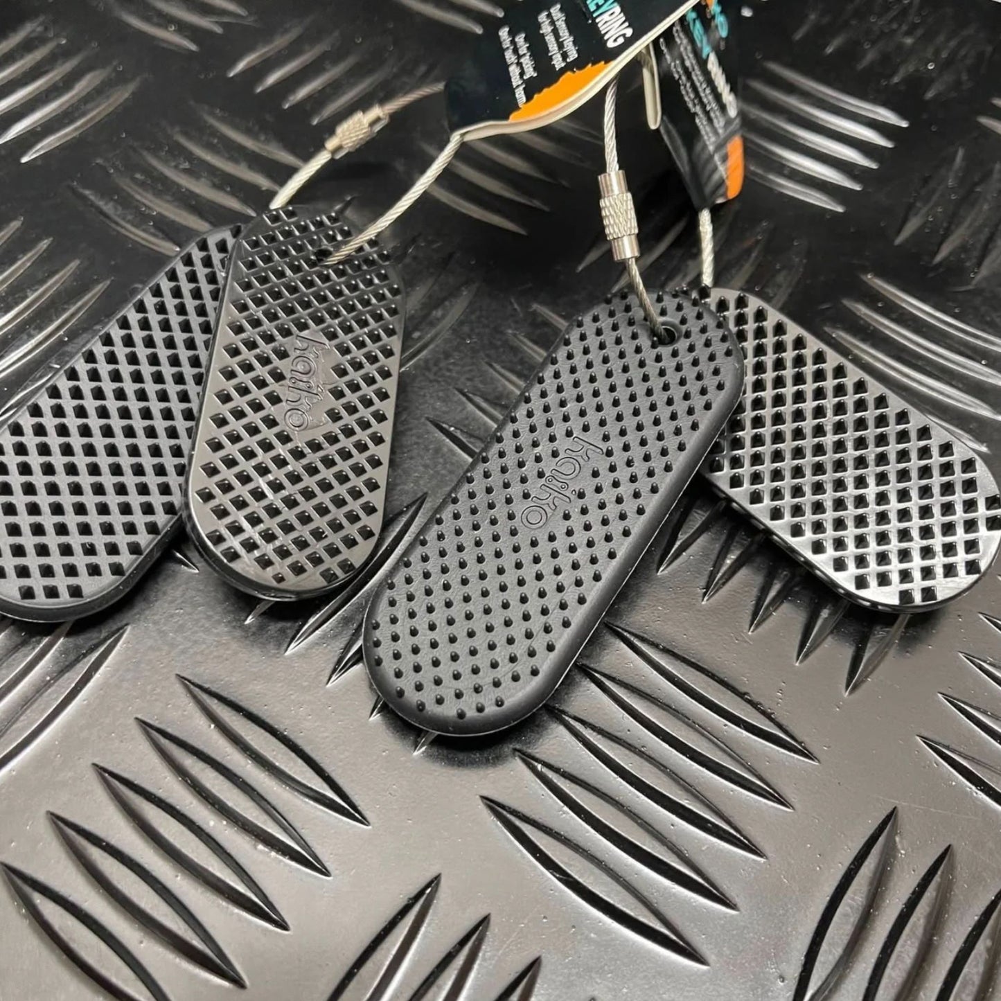 Two sets of the Spikeyring with Dual Pads by Kaiko in Black - Harm & Picking Support