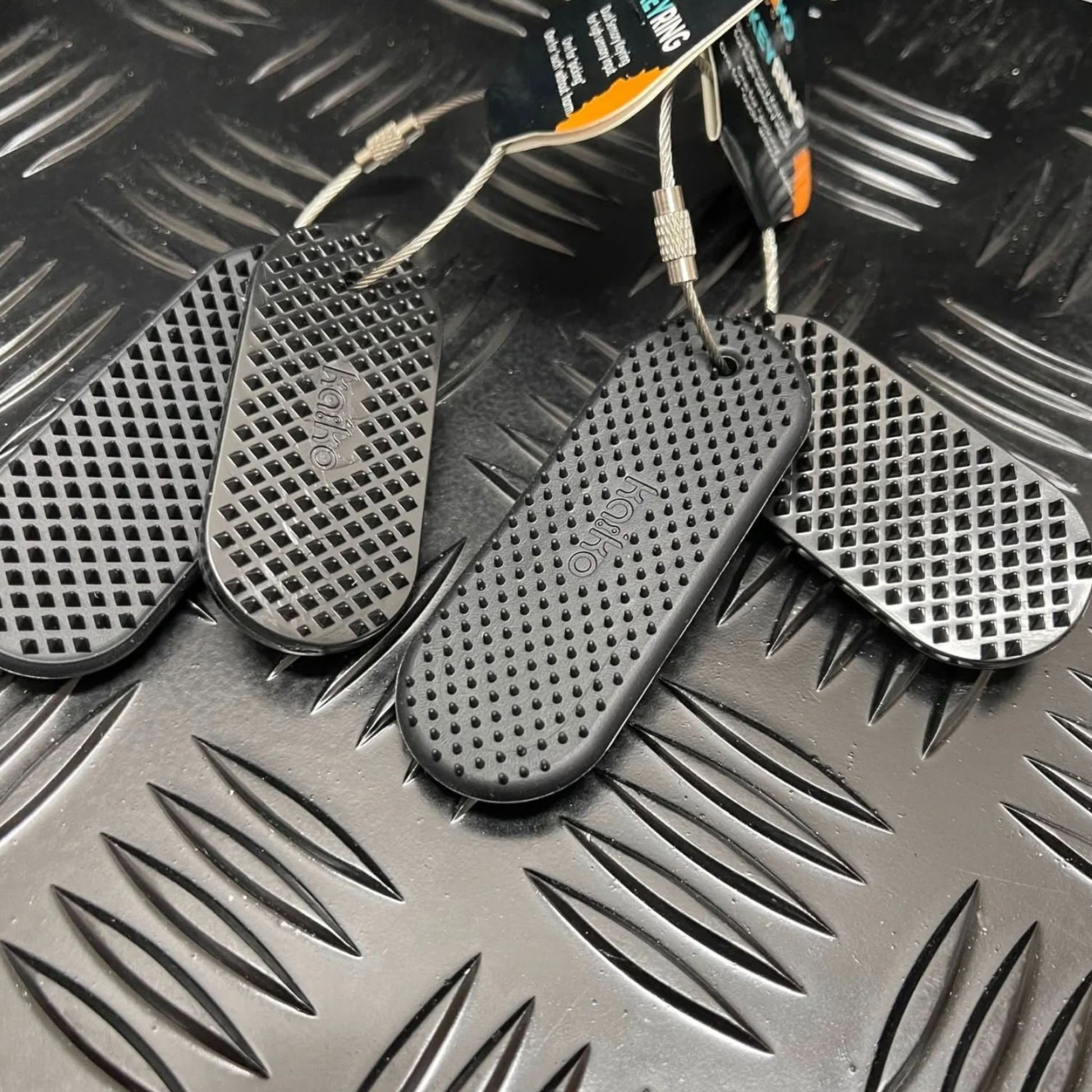 Two sets of the Spikeyring with Dual Pads by Kaiko in Black - Harm & Picking Support