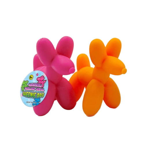 Two colourful balloon animal dog fidget toys, one pink and one orange, on a white background with a visible brand label.