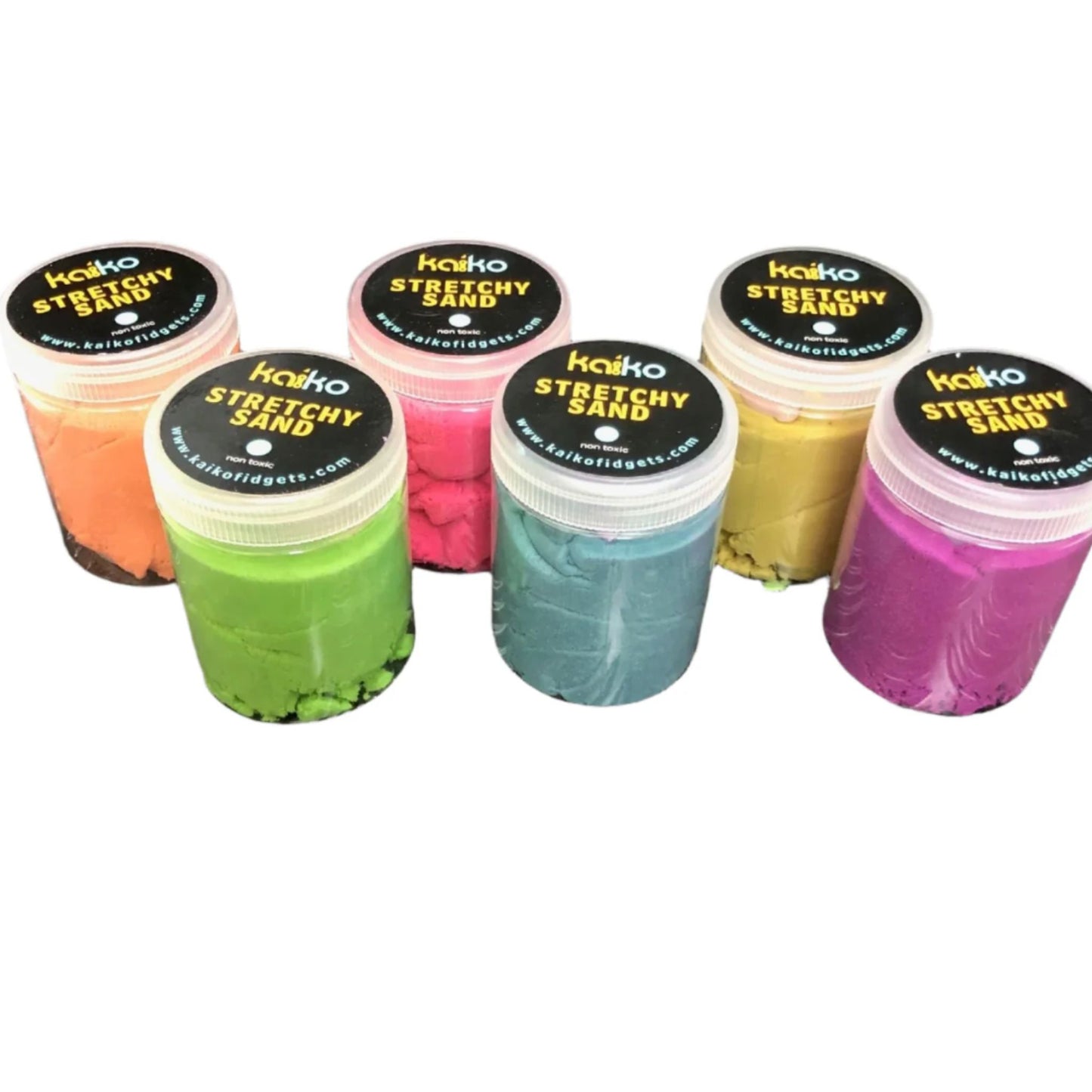 Set of colorful stretchy sand containers with lids on a white background