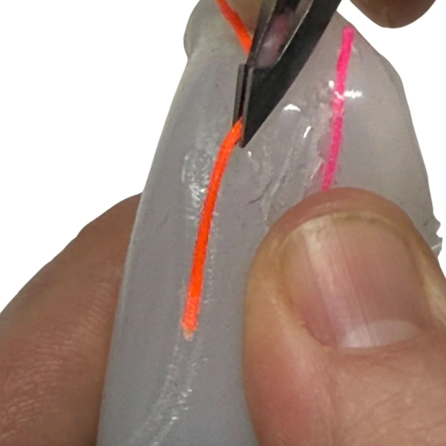 Close up of extraction from Thread Pick Em Stack 3-Pack Refill Picking, Popping & Hair Pulling Support Kit