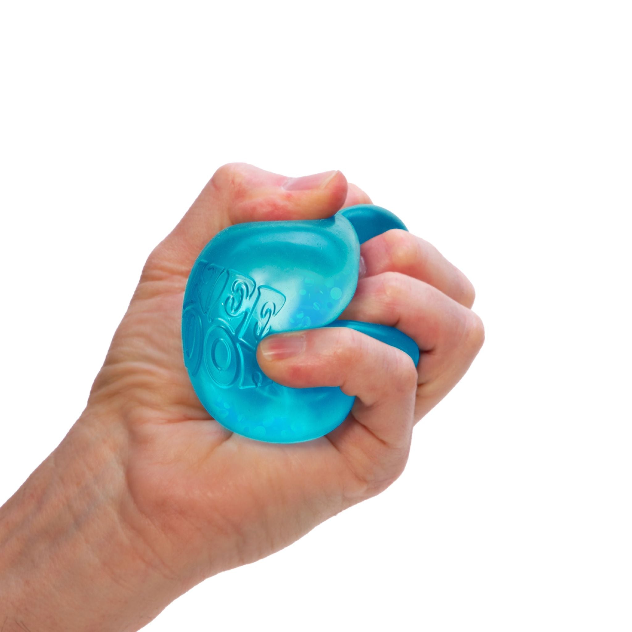 Hand squeezing NeeDoh Dream Drop blue squishy ball in packaging on a white background