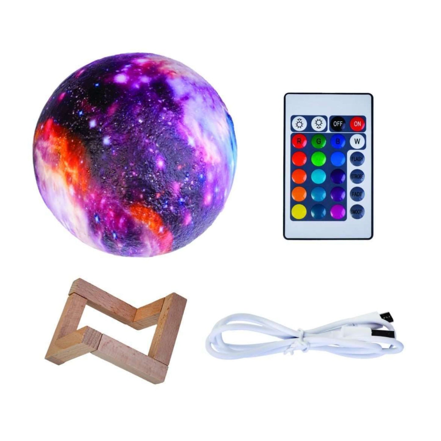 Galaxy-themed lamp with remote control and cable on a white background