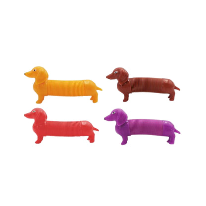Four colorful plastic dachshund pop tube fidgets on a white background