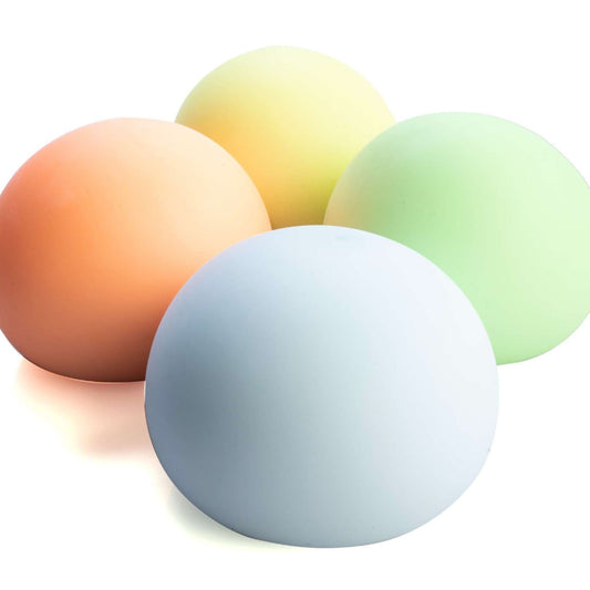 Smooshos Jumbo Glow in the Dark Ball stress ball in orange, yellow, green and blue